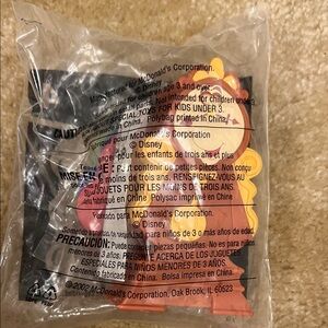 2002 Disney McDonald’s Cosgsworth Figure in Orange and Brown